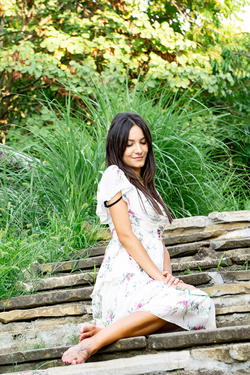 girl sitting in a white dress